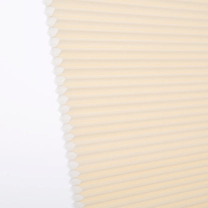 No-drill honeycomb shades close-up view, showcasing texture and design.