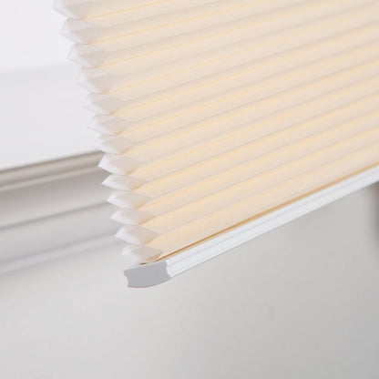 No-drill honeycomb shades with tool-free installation and energy-efficient design.