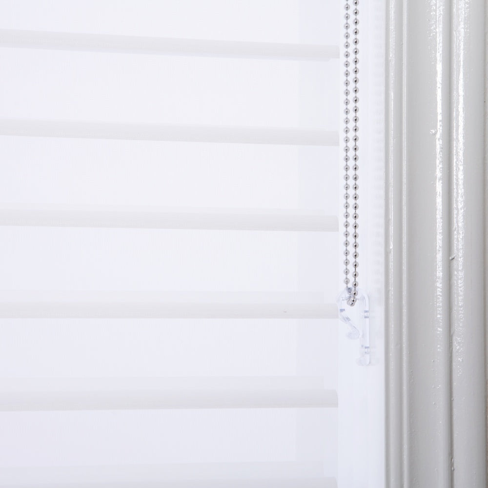 Light-filtering corded sheer blinds with white adjustable blades.