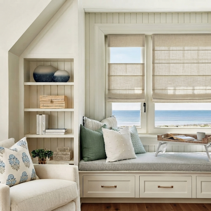 Top down bottom up Roman shades in natural linen with cordless light-filtering and blackout features on window