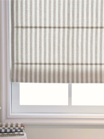 Classic striped roman shades with cordless lift, light filtering and blackout options on window