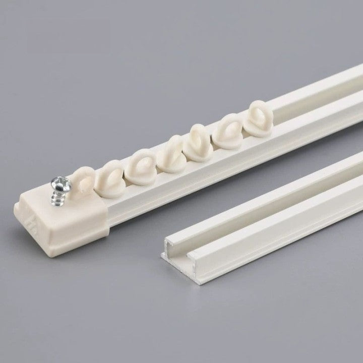 Ultra-thin ceiling curtain track in aluminum with whisper-quiet operation mounted on a flat ceiling
