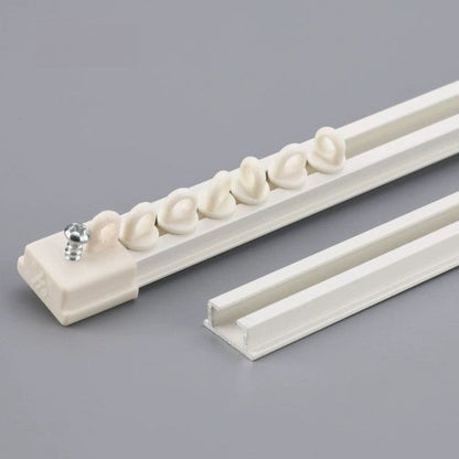 Ultra-thin ceiling curtain track in aluminum with whisper-quiet operation mounted on a flat ceiling