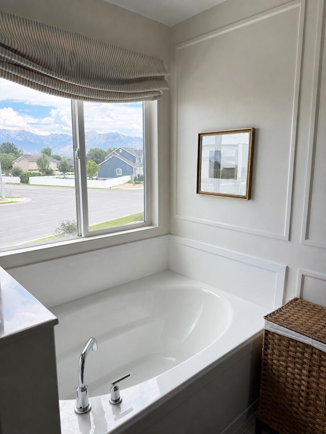 Custom cordless relaxed roman shades with soft curved bottom in modern living room
