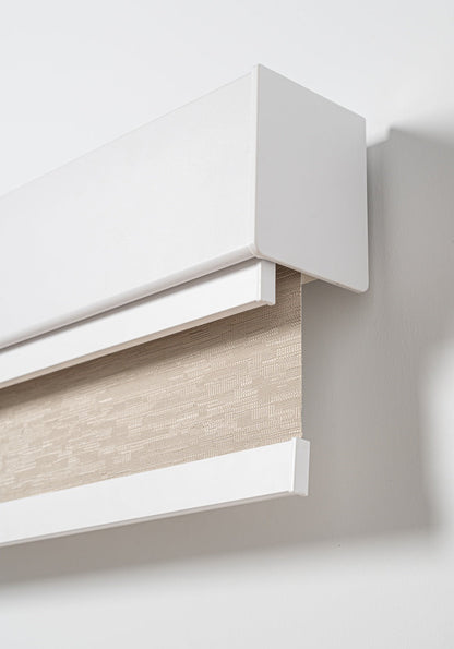 Double roller blinds with sheer and blackout layers in slim headrail for bedroom light control