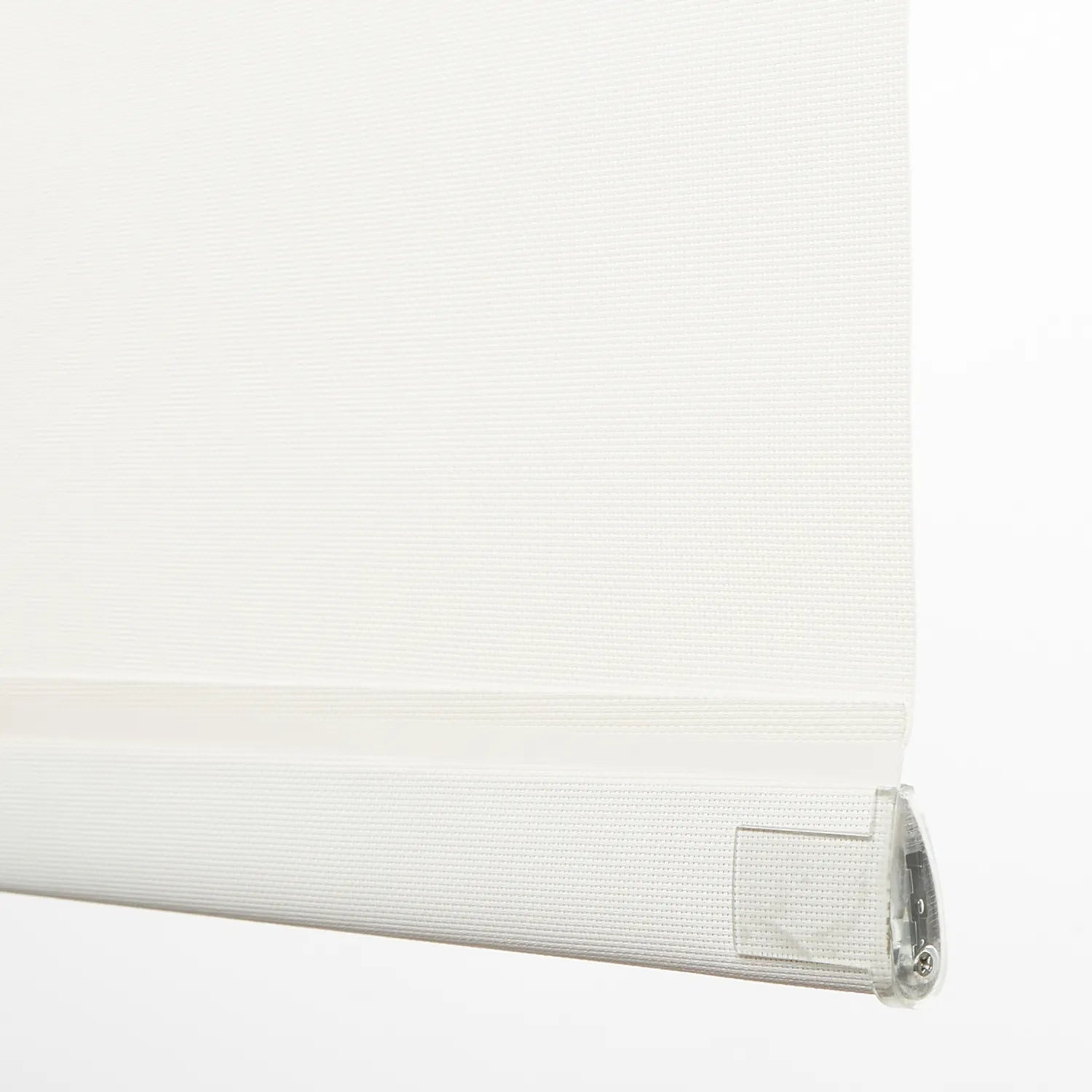 Close-up of EaseEase UV Blocker Roller Blind in white, featuring textured fabric and durable metal bracket