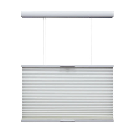 Cordless top-down bottom-up honeycomb shade in light gray, offering adjustable lighting and privacy
