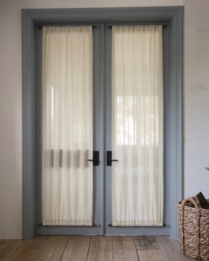 Custom rod pocket French door curtains designed for functionality and style on French doors
