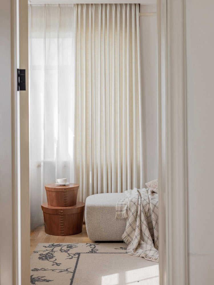 Elegant luxury French linen curtains in soft white, pink, blue, and gray-green tones with natural texture and drape