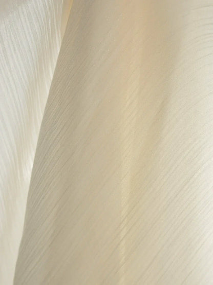 Luxury Galaxy sheer curtains with shimmering threads in a sunlit room
