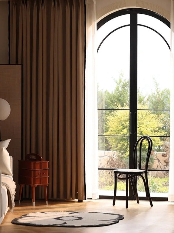 Heavyweight custom blackout chenille curtains in green and oatmeal with elegant drape for bedrooms