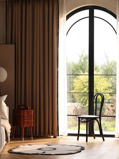 Heavyweight custom blackout chenille curtains in green and oatmeal with elegant drape for bedrooms