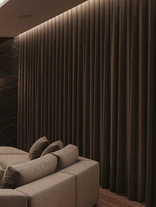 Luxurious high-matte velvet home theater curtains in deep black for sound insulation and light absorption