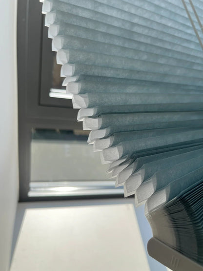Cordless 1 1/2" double cell honeycomb blinds with mulberry silk finish for thermal insulation and UV protection on windows