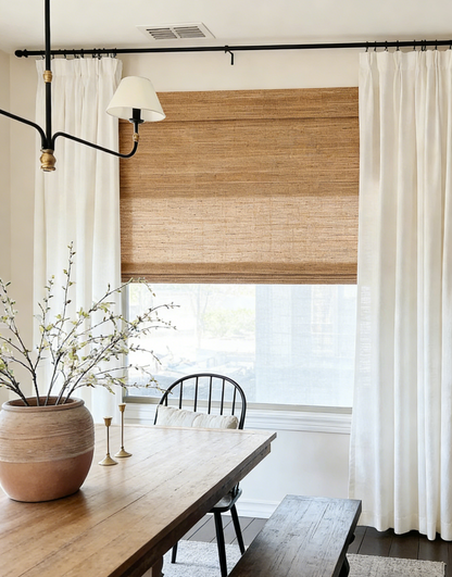 Brown woven jute blinds with natural texture filtering warm light in a modern farmhouse room