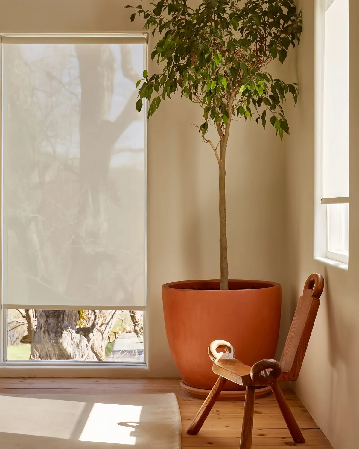 Cordless natural woven linen roller shades with clean modern design for residential windows