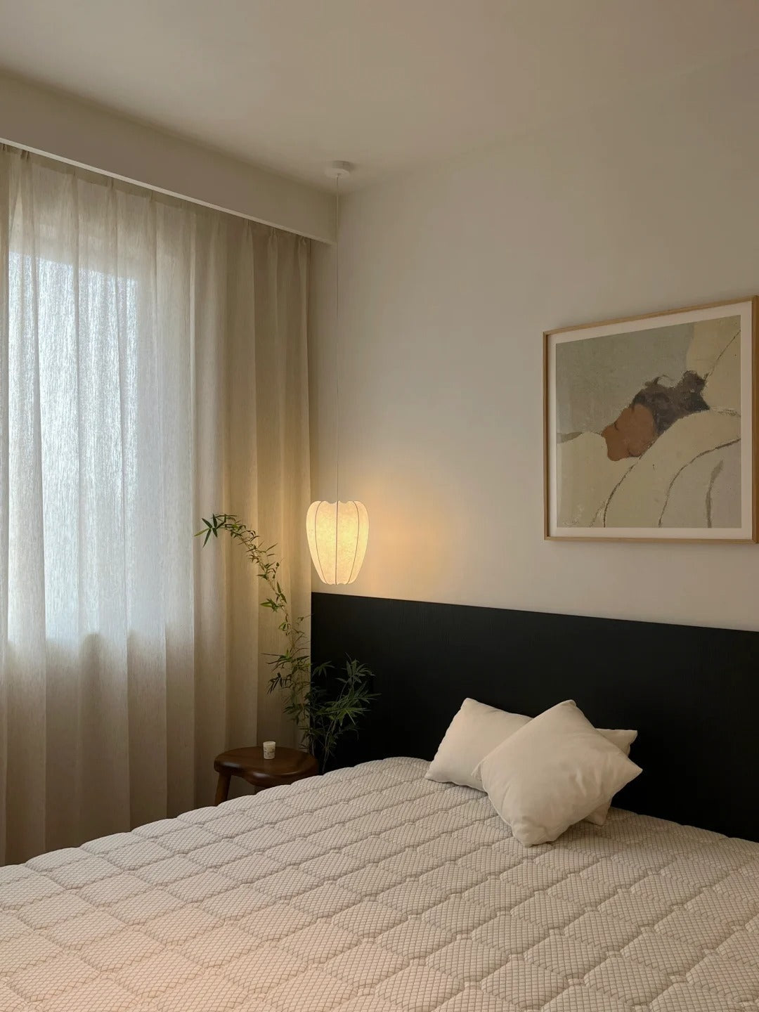 Beige linen-wool blend sheer curtains hanging in elegant living room with natural light filtering through