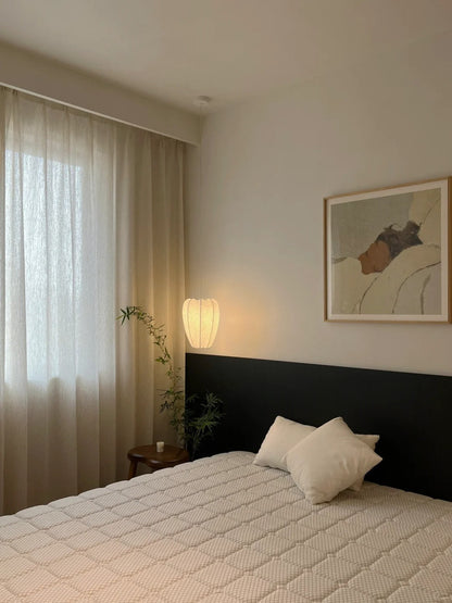 Beige linen-wool blend sheer curtains hanging in elegant living room with natural light filtering through