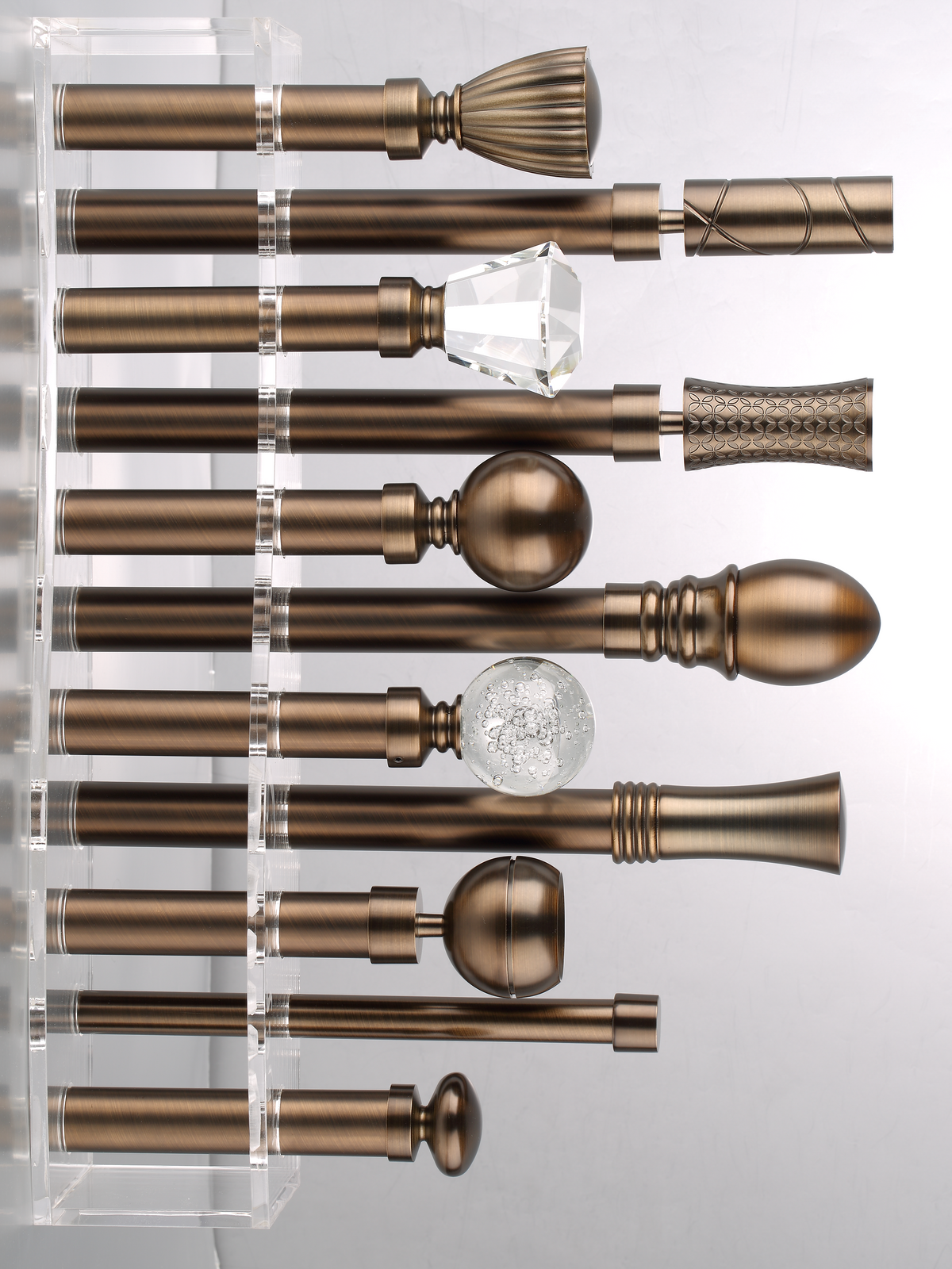 Luxury Traverse Curtain Rods, High end curtain rods with antique bronze finish, featuring various designer finials and seamless 90° corner connectors.