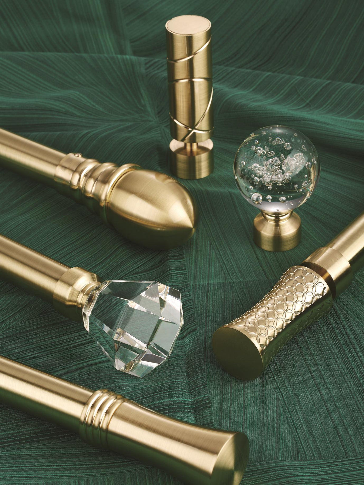 Luxury Traverse Curtain Rods, High end curtain rods with designer finials on a green background.