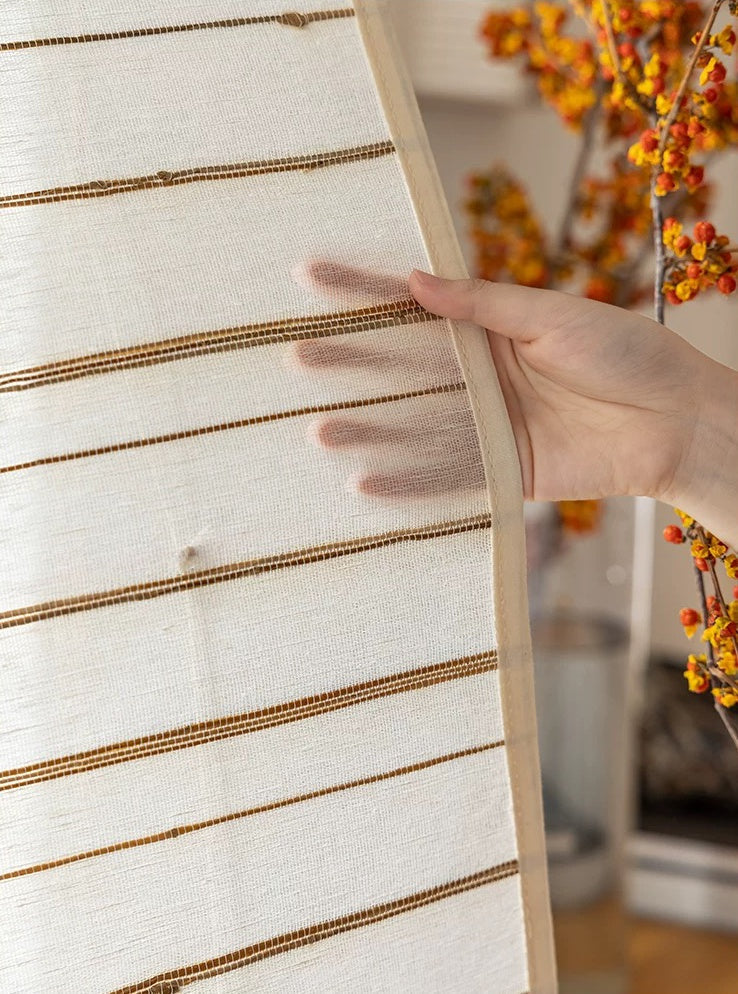 Natural bamboo shades in ivory sand color made from eco-friendly ramie with a textured, handcrafted woven design