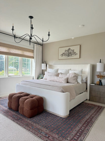 Natural Ramie Bamboo Roman Shades in beige, woven with a textured natural-fiber pattern and a roll-up design.