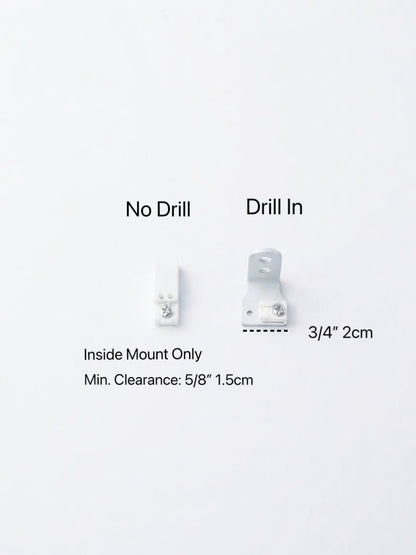 White metal mounting bracket shown on a white background with text labels 'No Drill' and 'Drill In', plus dimensions and clearance notes.