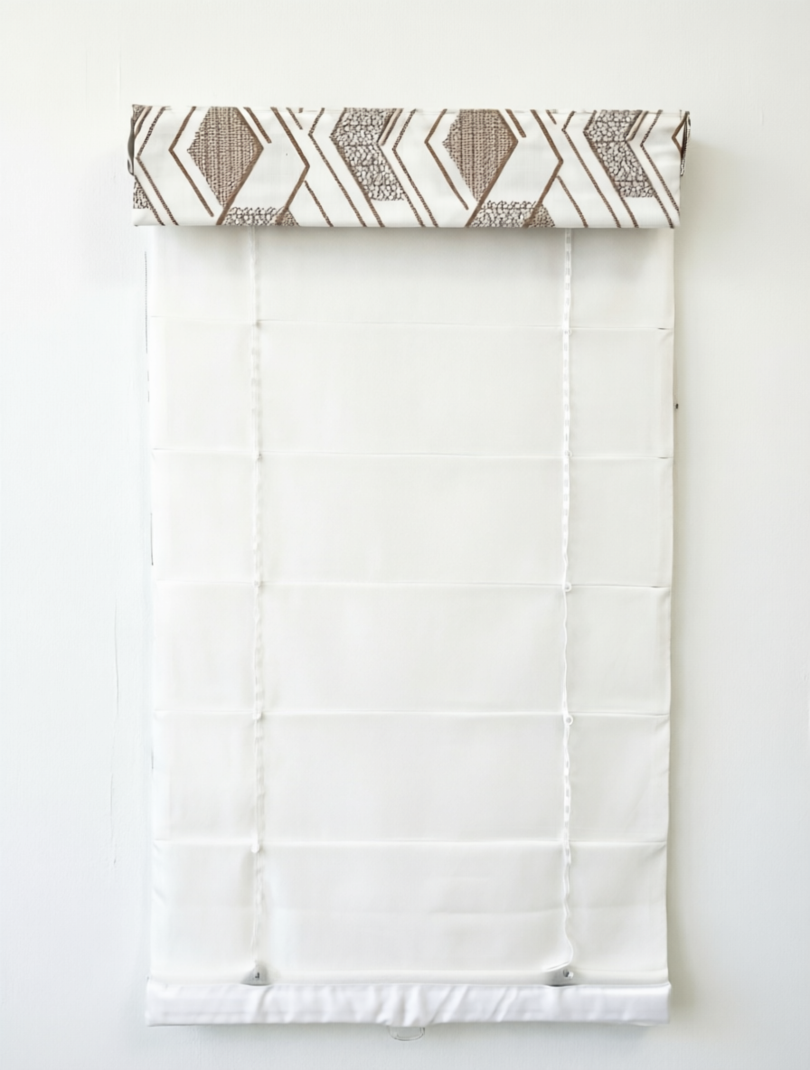 Patterned Roman Shades in white linen with raised geometric embroidery and a flat-fold design; cordless lift system visible.