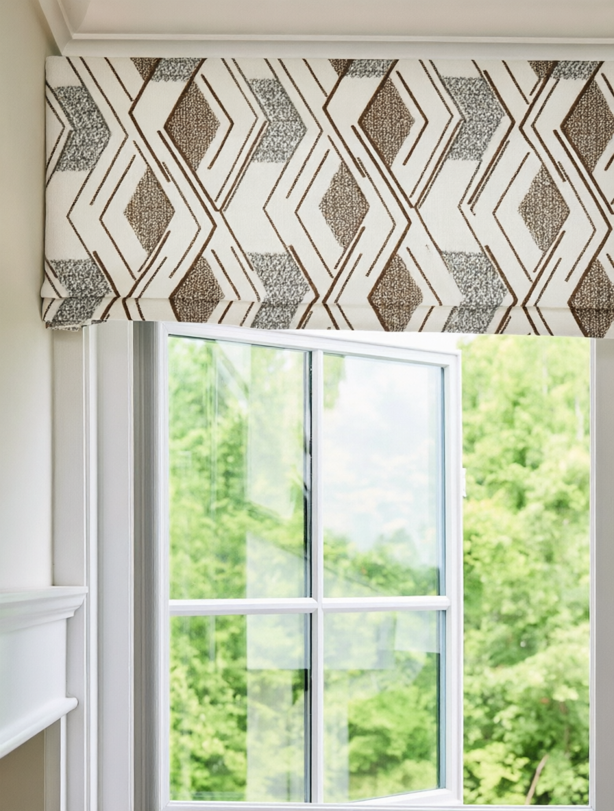 Patterned Roman Shades in cream linen with brown geometric embroidered diamonds and flat fold design