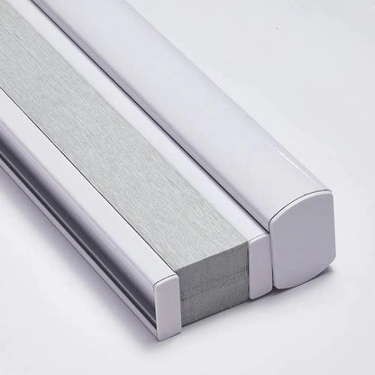 Close-up of EaseEase Double-Layer Day Night Cellular Shades in grey and silver, providing options for semi-shading and full blackout