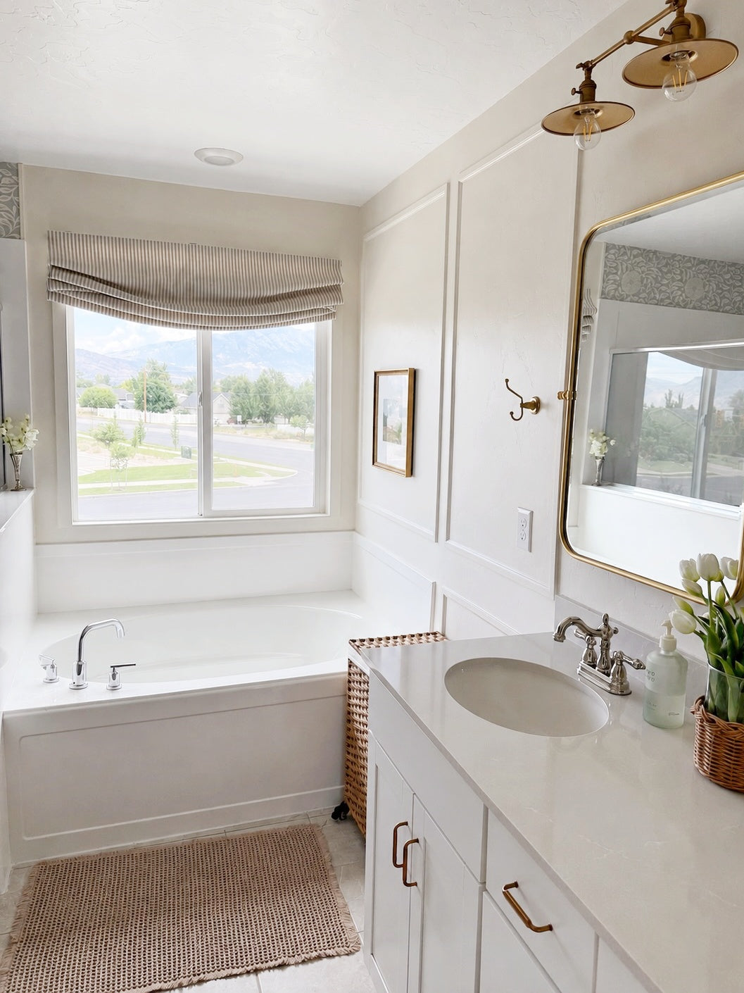 Cordless striped Roman shades with light filtering and blackout options for child-safe window treatment