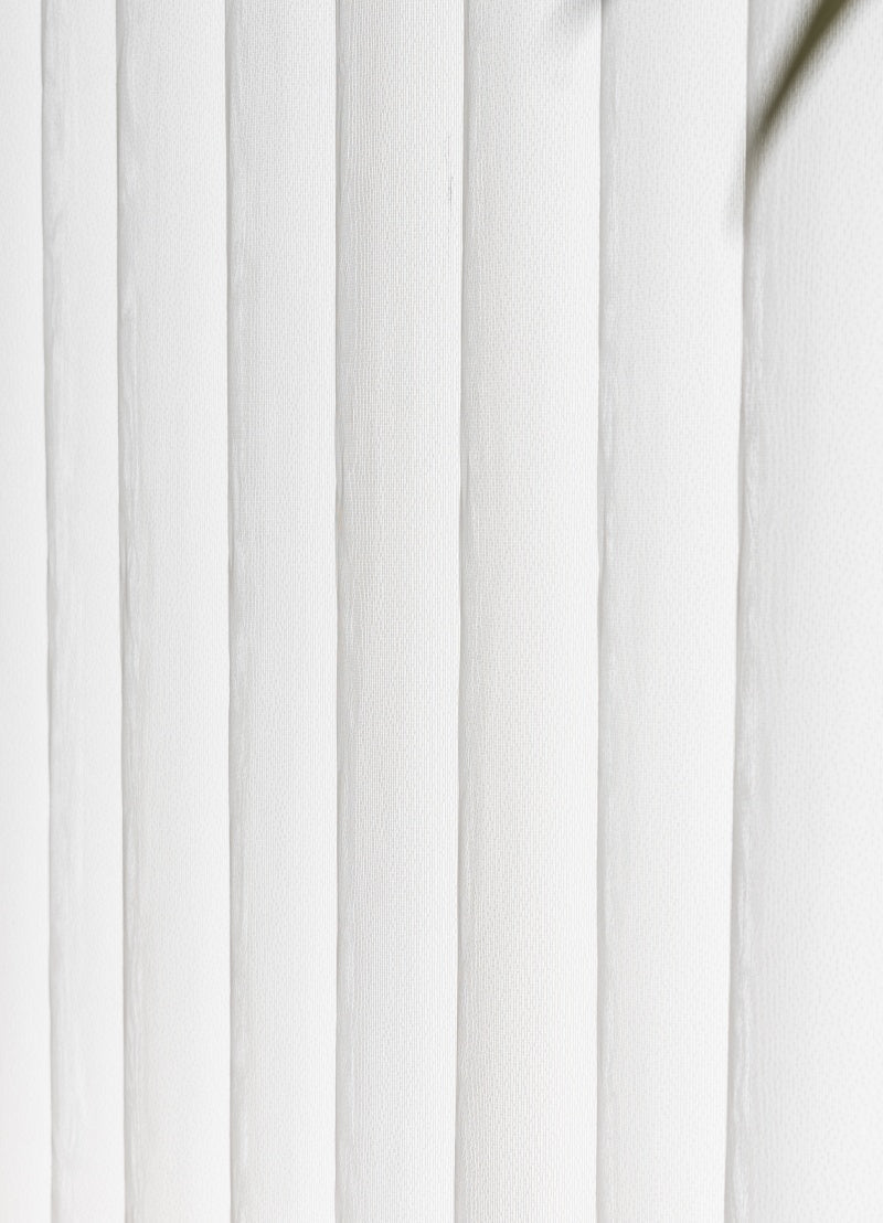 Sheer curtain panels sliding horizontally with adjustable vanes for light filtering on large windows