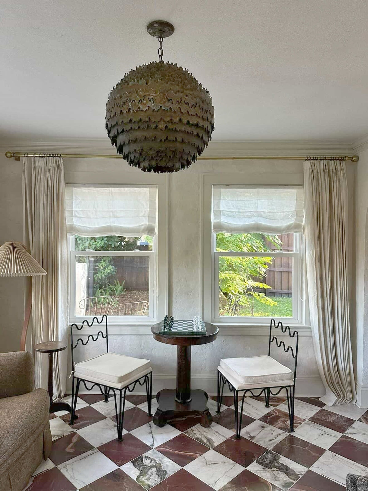 Corded sheer Roman shade in 100% pure linen with soft natural light filtering and visual privacy