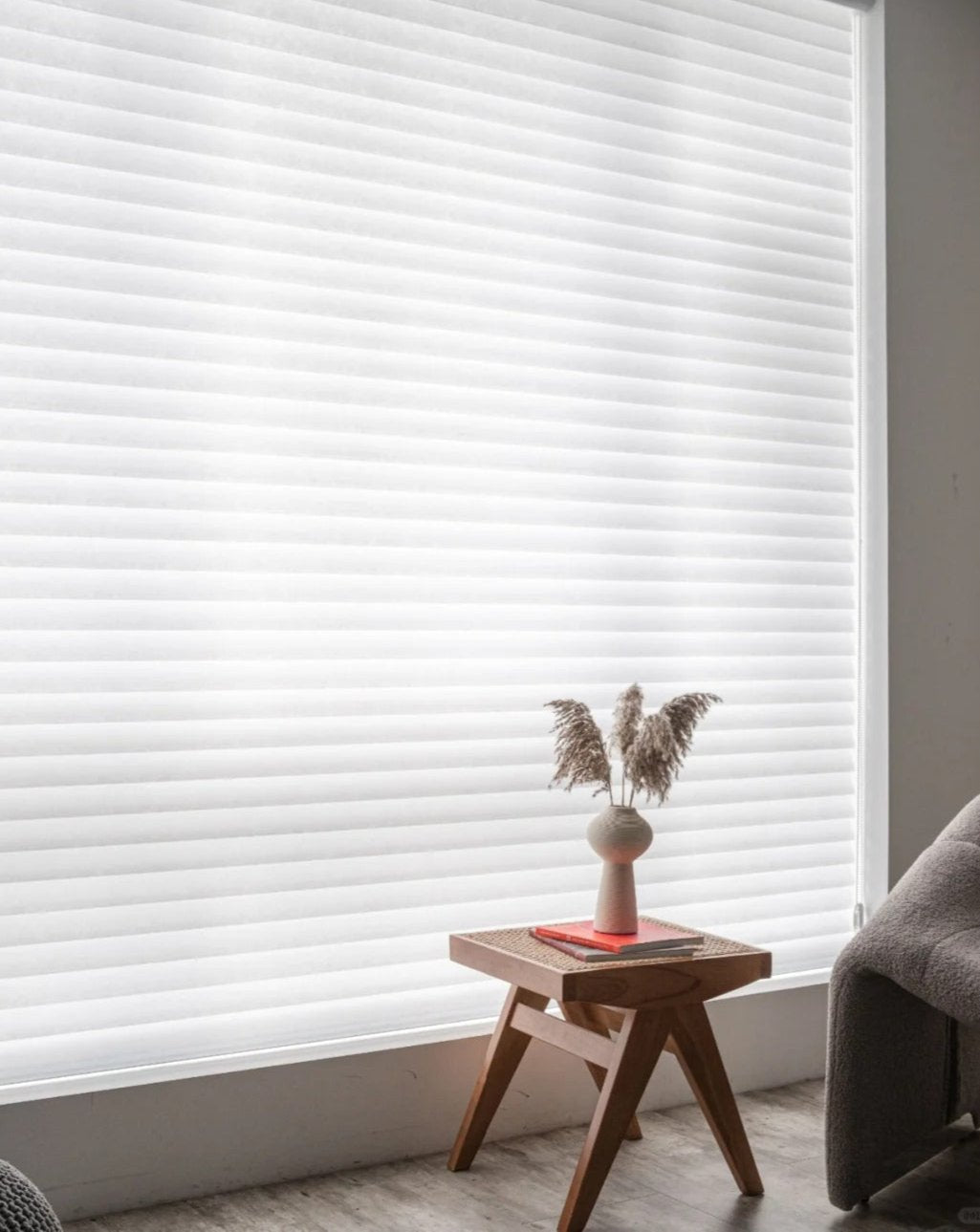 Light-filtering corded Shangri-La sheer shades with adjustable horizontal fabric blades for privacy and soft light control in large living rooms and low-light spaces
