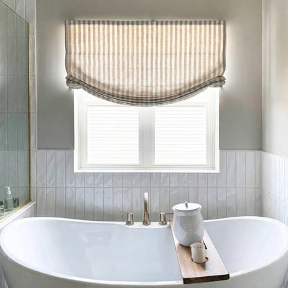 Classic striped Roman shades with cordless lift, available in light filtering and blackout options for child-safe, stylish window treatments
