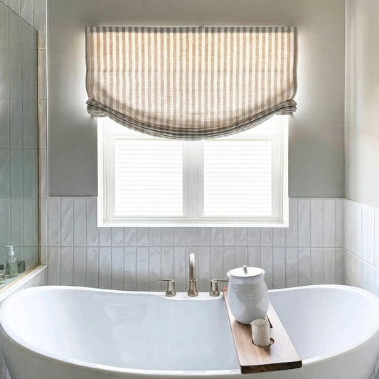 Classic striped Roman shades with cordless lift, available in light filtering and blackout options for child-safe, stylish window treatments