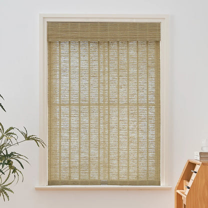Natural jute bamboo outdoor shades in oak tone installed in window.