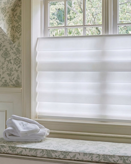 Custom hobbled Roman shade Top Down Bottom Up Roman Shades with soft folds and linen material in a modern window setting