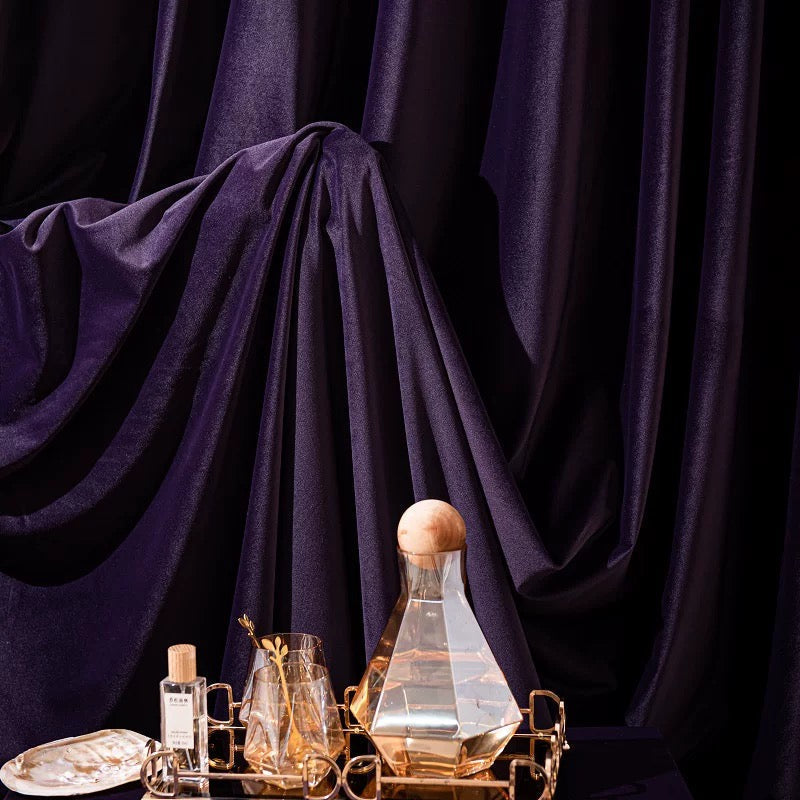 Luxurious deep-colored soft sheen velvet drapes in living room and bedroom settings
