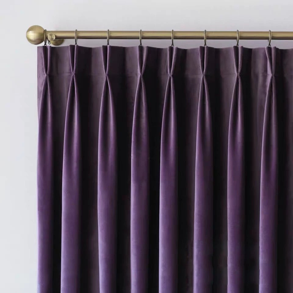 Luxurious soft sheen velvet drapes in deep rich colors enhancing living room and bedroom interiors