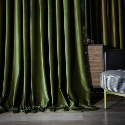 Luxurious soft sheen velvet drapes in rich colors enhancing elegant living room and bedroom decor