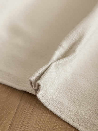 White blackout curtains linen blend in off-white laid flat showing Morandi color and texture.