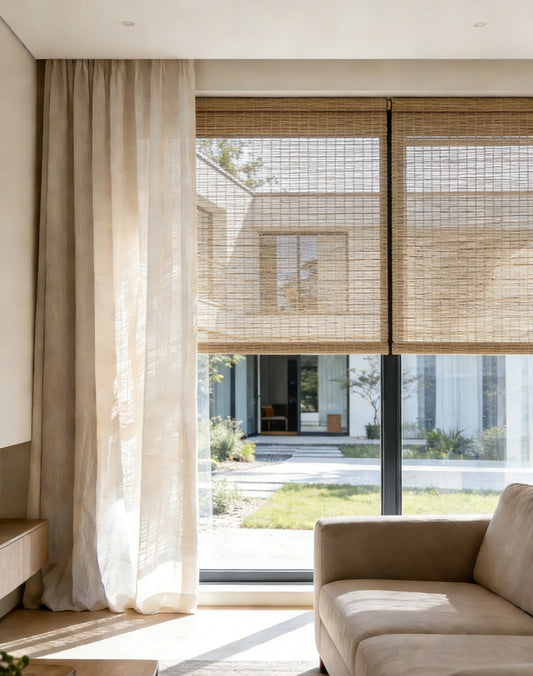 Woven Roman Shades in natural cinnamon jute, featuring a textured woven pattern and light-filtering design